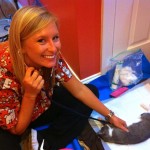 Veterinary Assistant Rebecca checks on a kitty after it's neuter